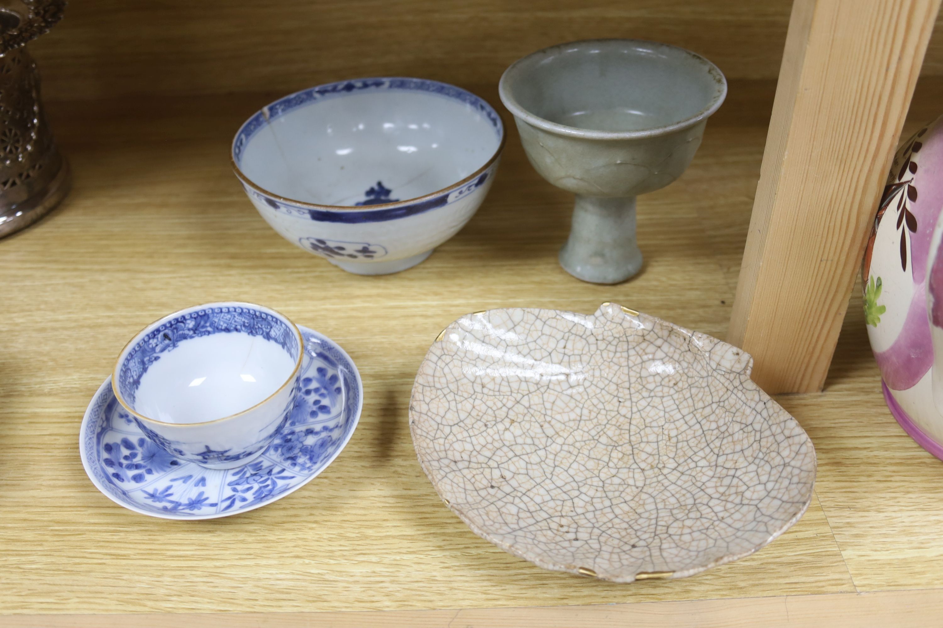 A Chinese blue and white bowl, diameter 15cm, a tea bowl and saucer, a crackleglaze shell dish and a celadon glazed stem cup